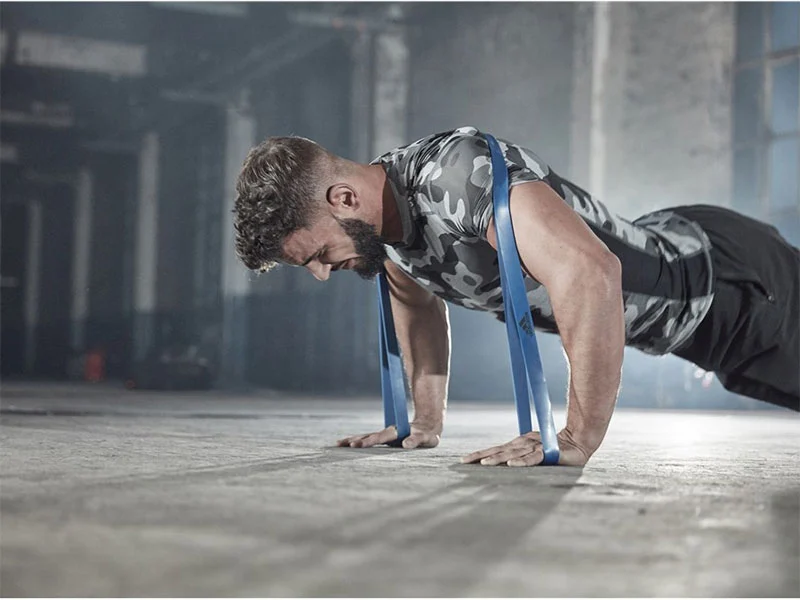 Person exercising with resistance band